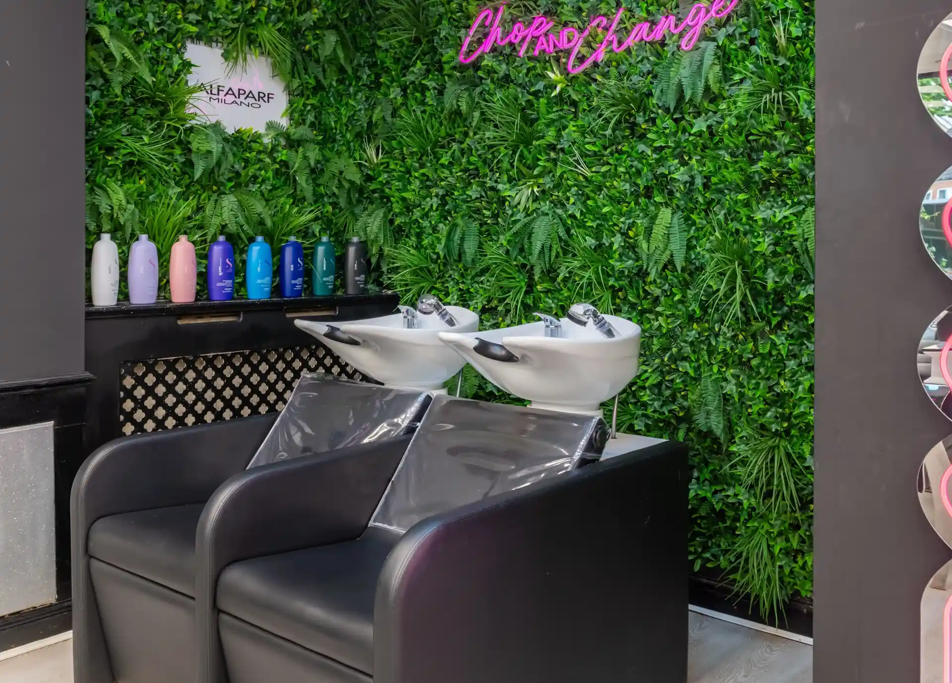 Hair wash stations at Hallie's Beauty with professional products